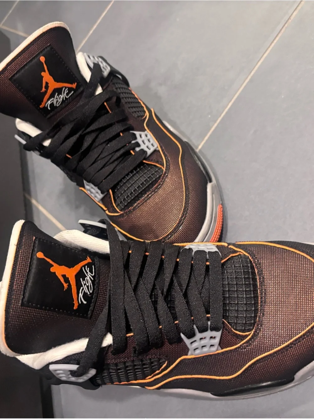 Jordan Black with Orange Trim High-Top Sneakers